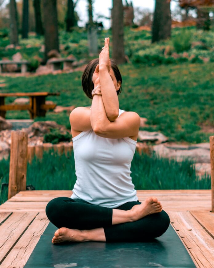 Photo by Erik Brolin woman performing yoga