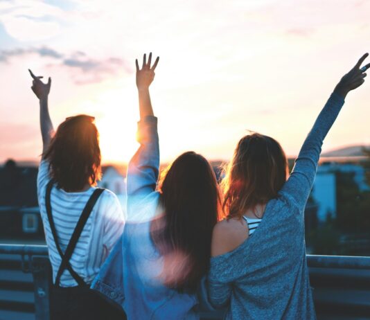 건강한 라이프스타일을 위한 첫 걸음: 식습관과 운동 photo of three women lifting there hands