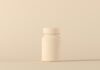 ‘맞춤형’으로 진화하는 영양, 내게 꼭 맞는 보충제 고르기 a bottle of medicine sitting on top of a table