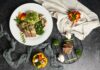 ‘균형 잡힌 식단’이 열풍… 나에게 맞게 실천하는 새로운 식탁 문화 a white plate topped with meat and veggies