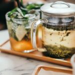 일상 속 작은 변화, 대체요법으로 건강 지키기 clear glass mug on tray