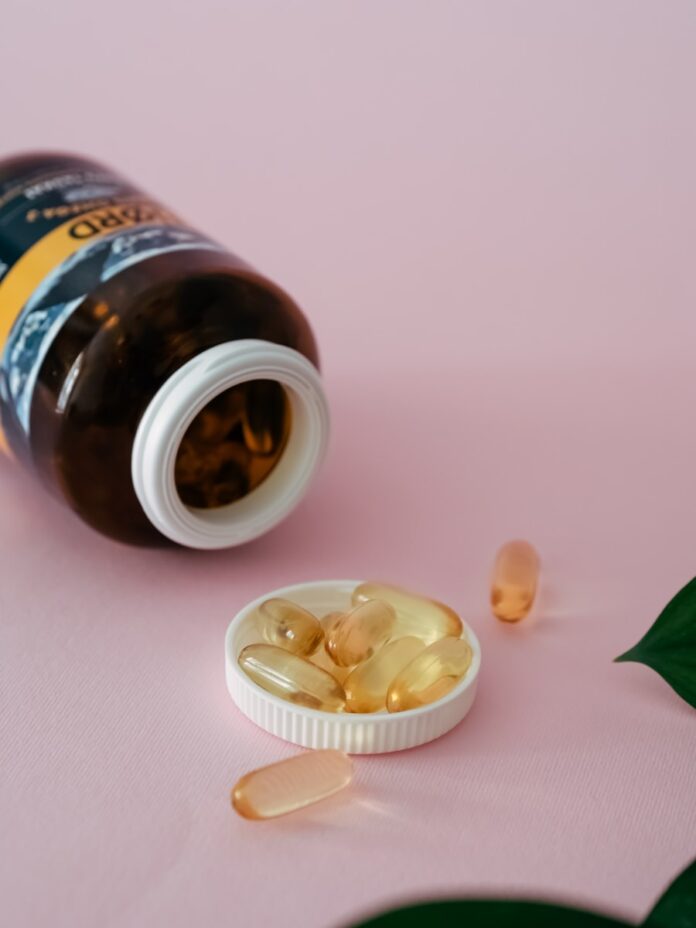 a bottle of pills sitting on top of a table