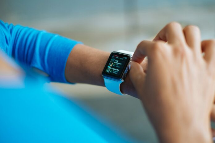 Photo by Luke Chesser person operating smartwatch
